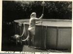 1966-Juliet vacuming pool.jpg
