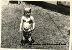 1966-Summer Terry in backyard in boots.jpg