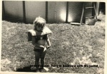 1966-Summer Terry in backyard with life jacket.jpg