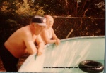 1977-07 Dismanteling the pool, Dad & Mom emptying pool.jpg