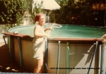 1977-07 Dismanteling the pool, Mom cleaning pool.jpg