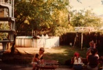1977-07 Moms backyard, Darren, Terry,Jenny, Stacey.jpg
