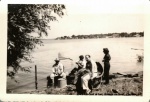 1943-08 Curt w hat, Romeo on boat, Clayton, NY.jpg
