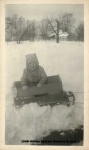 1948-Winter upstate Barbara in sled_1.jpg