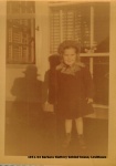 1951-04 Barbara Slattery behind house, Levittown.jpg