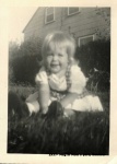 1957- Meg in Mom's yard, Summer .jpg