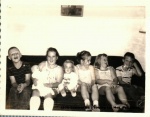 1958-Summer Barb holding Liz, Meg, Pat, Eileen.jpg