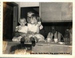 1960-Liz, Uncle Buddy, Meg, grand BoBo in back.jpg